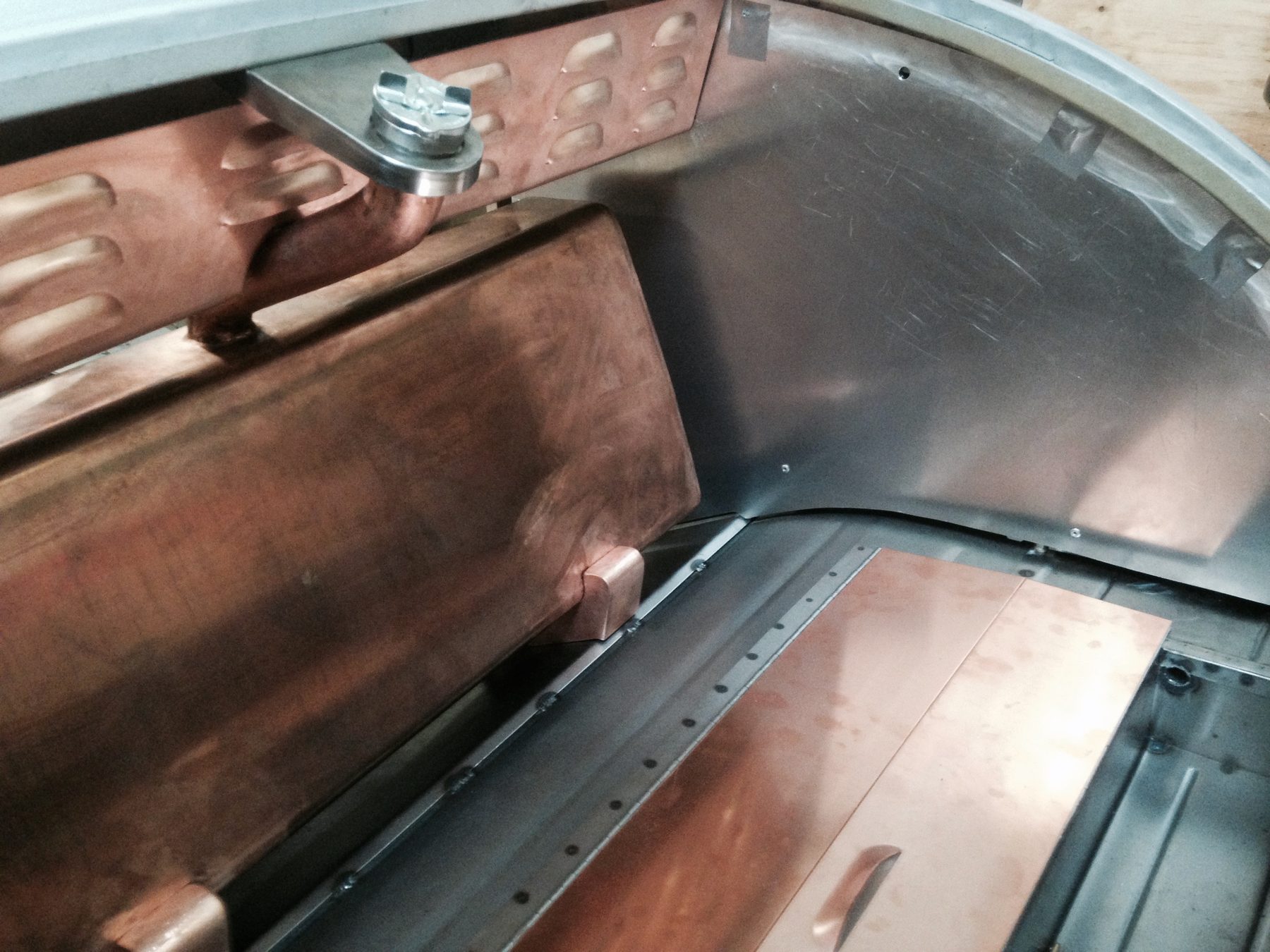 Copper trunk paneling and rivet work