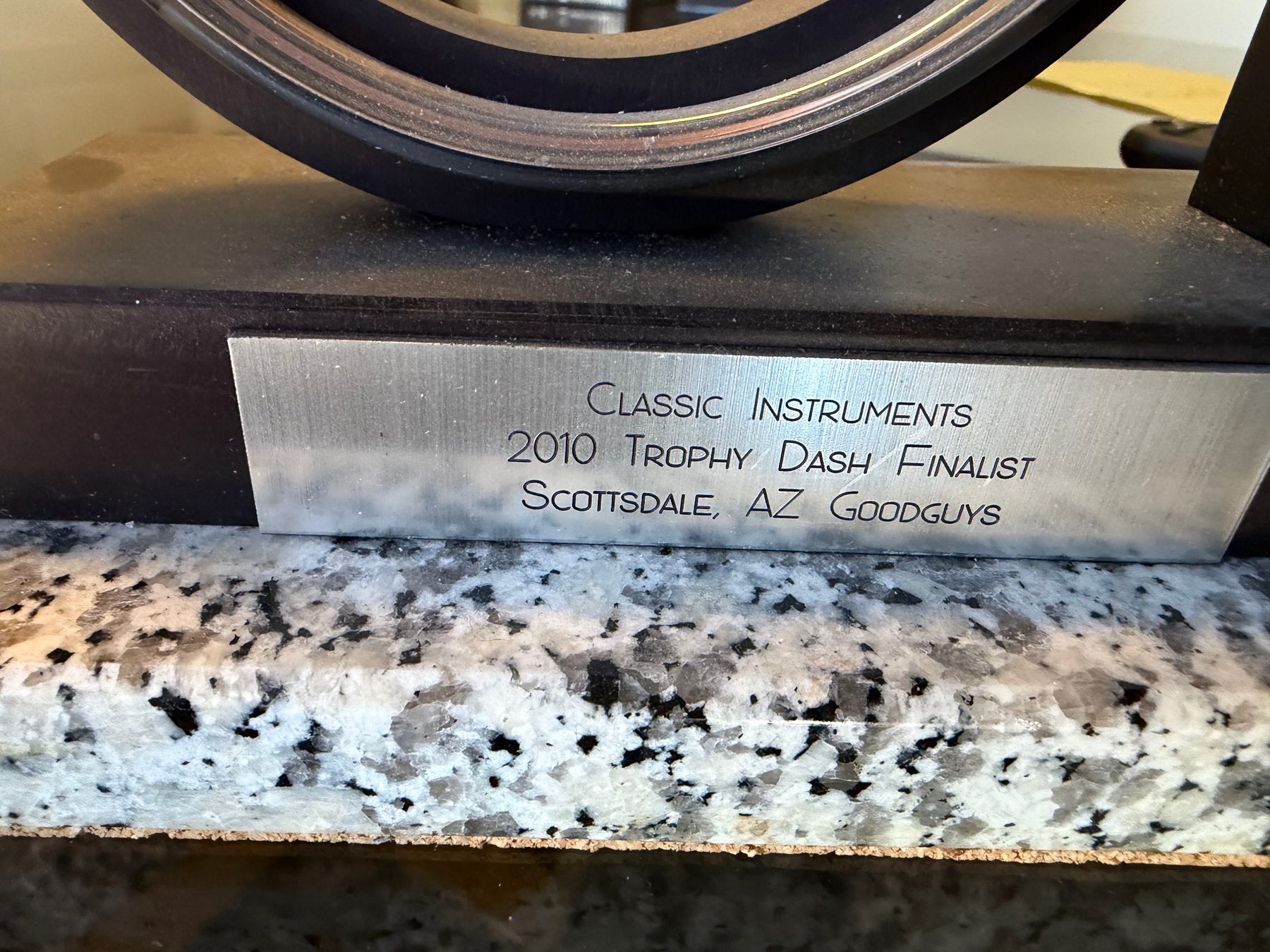 Close-up of the Trophy Dash Finalist award plaque